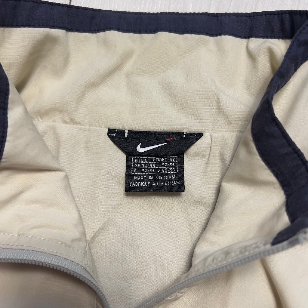 Nike vintage 90’ trackjacket (L)