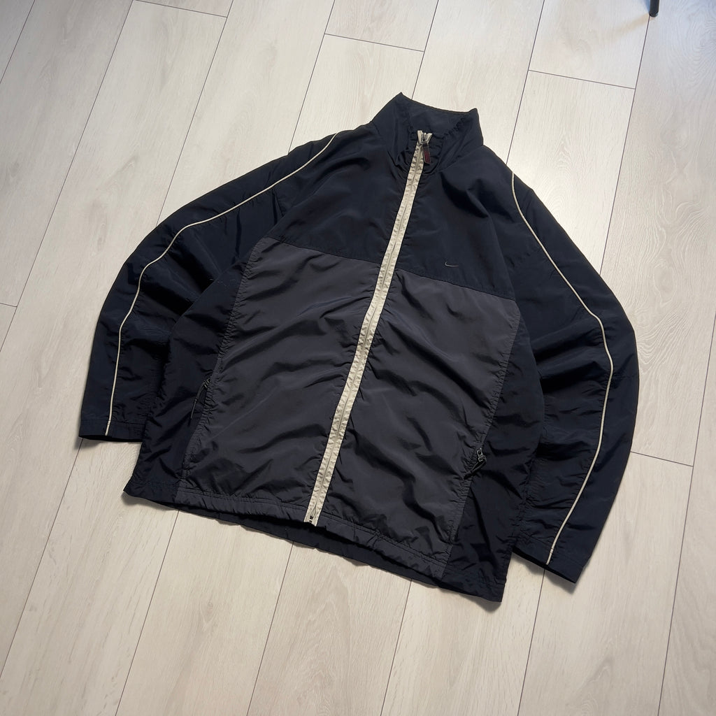 Nike vintage 90’ trackjacket (L)