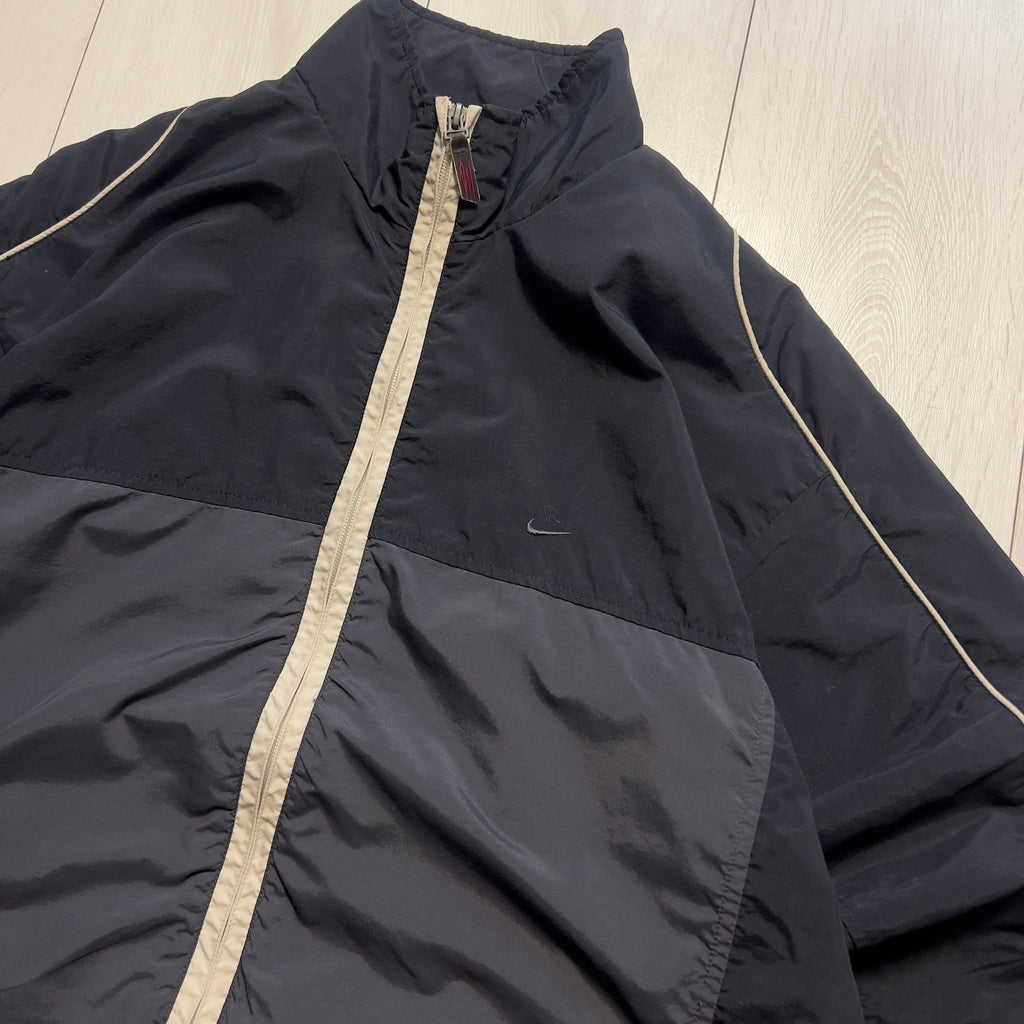 Nike vintage 90’ trackjacket (L)