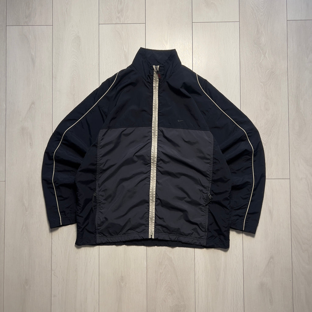 Nike vintage 90’ trackjacket (L)