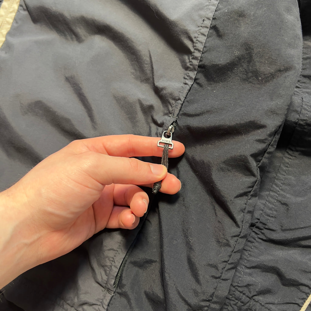 Nike vintage 90’ trackjacket (L)