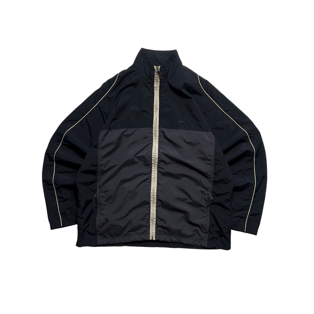 Nike vintage 90’ trackjacket (L)