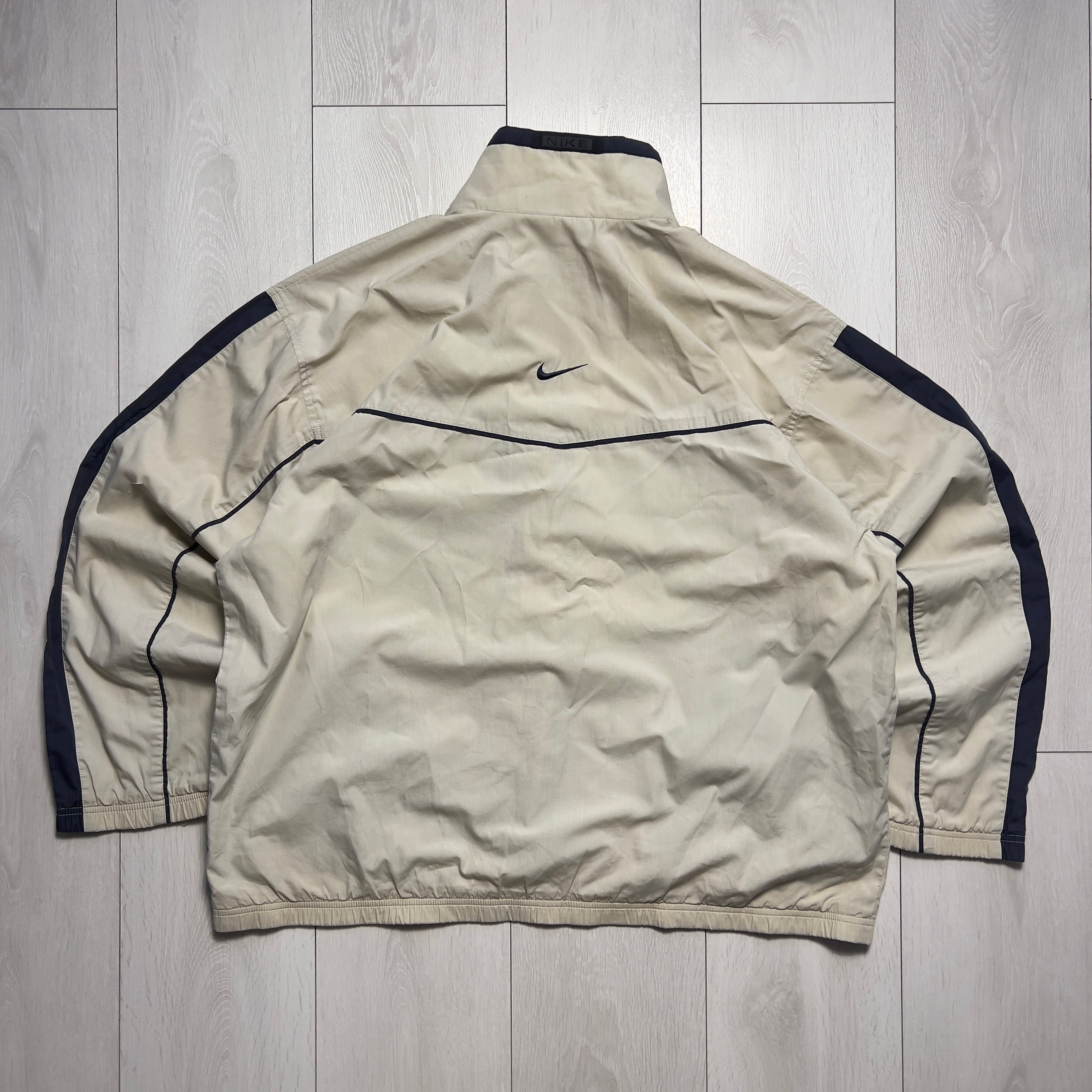 Nike vintage 90’ trackjacket (L)